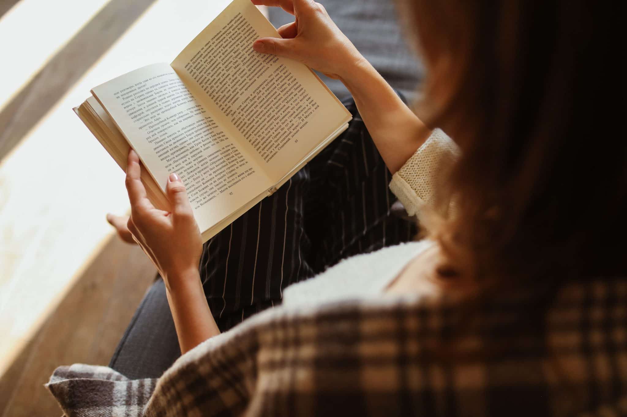 Woman reading a book.